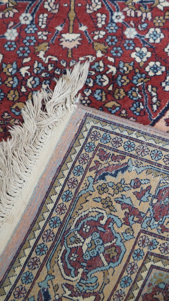 Image 1 of Handgeknoopt oosters vloerkleed met verfijnde patronen 232x139cm