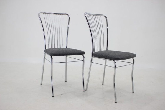 Image 1 of Set van zes Italiaanse eetkamerstoelen van chroom en bouclé, jaren 70.