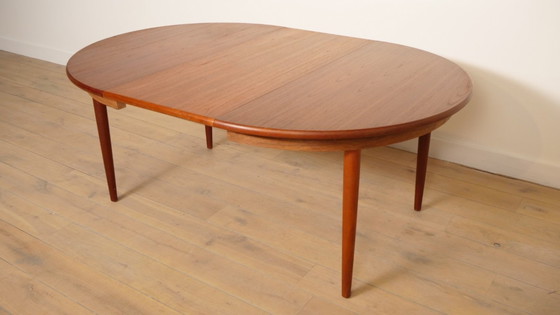 Image 1 of Table de salle à manger ronde vintage | extensible | teck | 130 - 240 cm