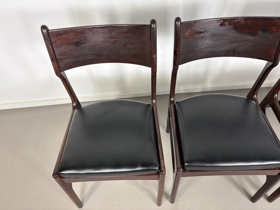 Image 1 of Set off 4 Vintage Palissander Wood With Black skai Leather dining chairs