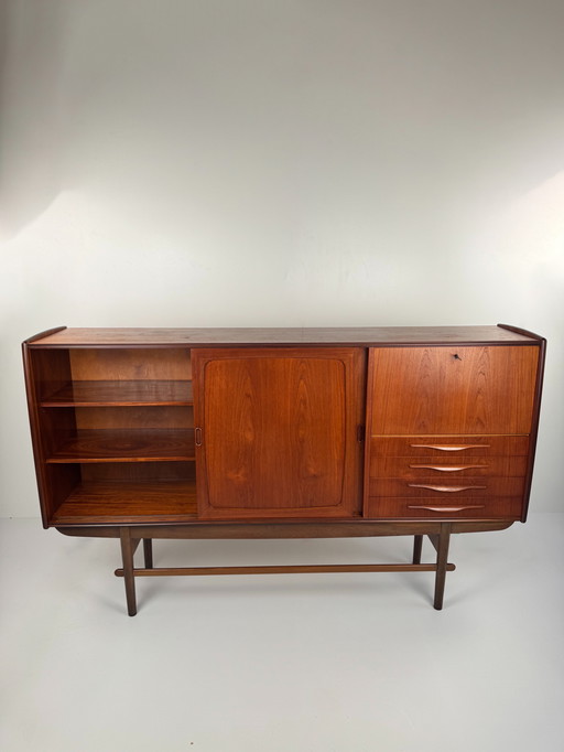 Danish teak sideboard with bar and automatic light - Mid - Century Elegance