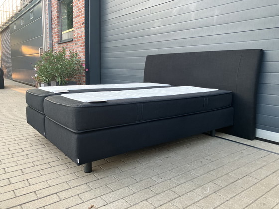 Image 1 of Auping Boxspring 160x200 nero con materassi Auping Cresto in ottime condizioni!