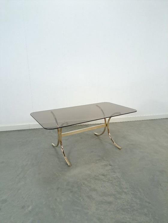 Image 1 of Tavolino in vetro fumé con gambe dorate dalla Svezia