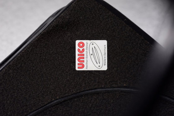 Image 1 of Poltrona girevole e pouf in pelle nera danese moderna vintage di metà secolo di Unico, anni '70, set di 2