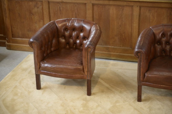 Image 1 of Een paar met leer beklede clubstoelen