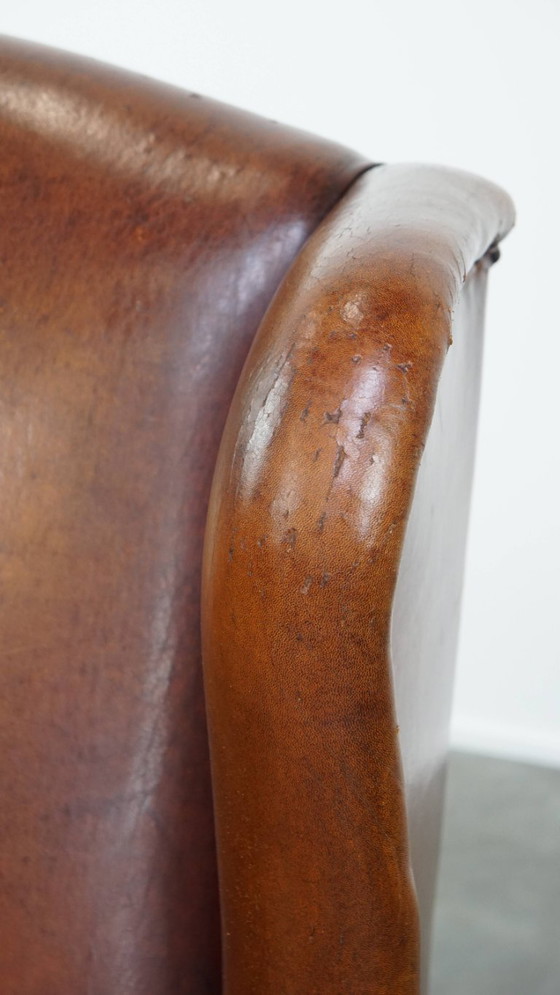 Image 1 of Grote vintage schapenleren oorfauteuil