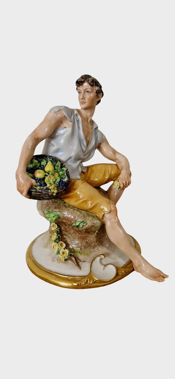 Image 1 of Statuette Man, Vinogram