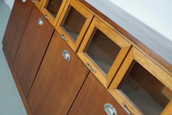 Image 1 of Vintage Nederlandse beuken- en eikenhouten fourniturenkast / graankast, jaren 1950