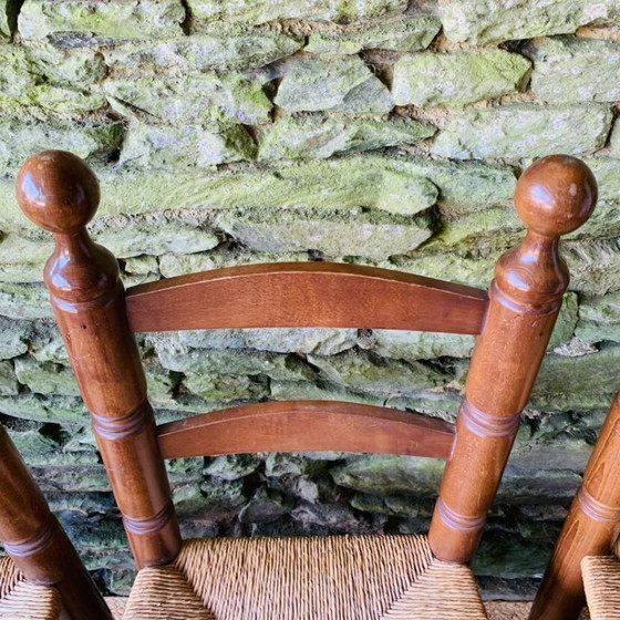 Image 1 of Set van 4 massief houten stoelen met rieten zittingen