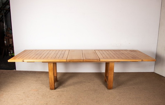 Image 1 of Gran mesa de comedor extensible de roble macizo, diseñada por Guillermo y Chambron en 1960.