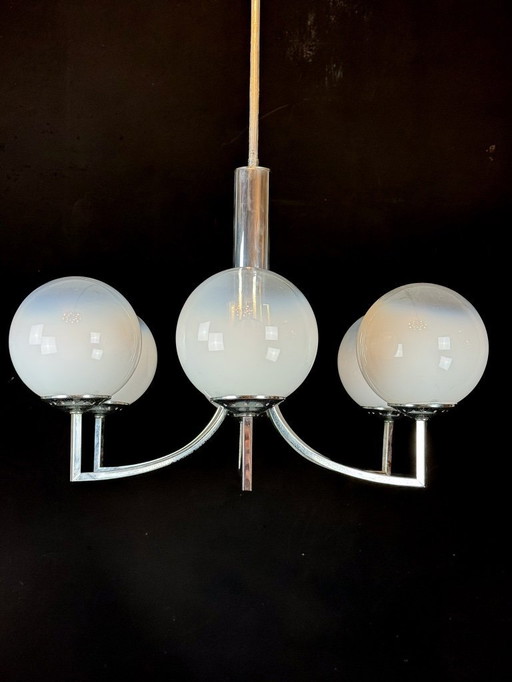 Six arms chandelier in murano glass spheres and chrome. Italy 1960s