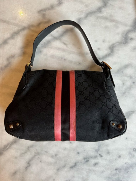 Image 1 of borsa con morsetto per cavalli