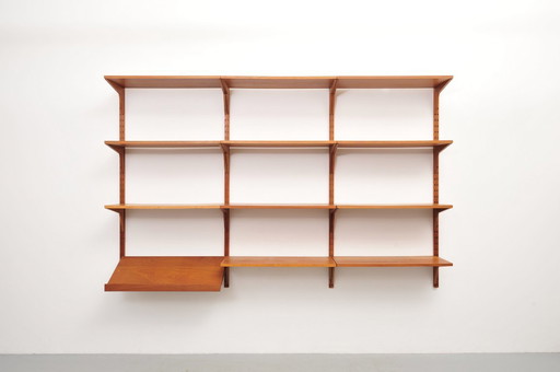 "Royal System" wall shelf made of teak by Poul Cadovius for Cado (1950s)