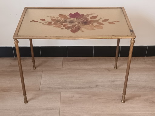 Bronze side table with pressed flowers