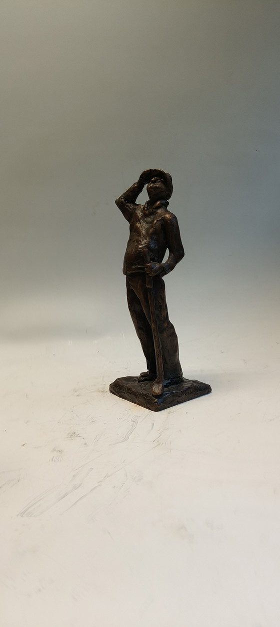 Image 1 of Image de sculpture en bronze et laiton représentant un golfeur, homme suivant