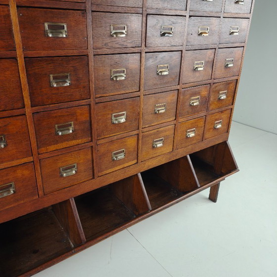 Image 1 of Oak apothecary cabinet from the early 20th century with 42 drawers