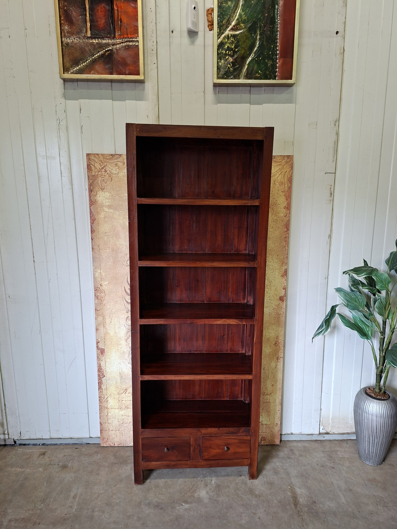 Librería de teca, dimensiones 69x30cm y 190cm de alto.