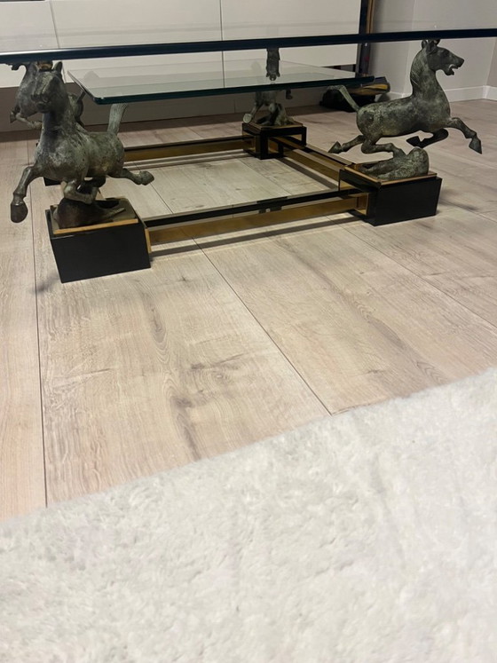 Image 1 of Salontafel "Vliegend Paard van Gansu" van Maison Charles uit de jaren 70.