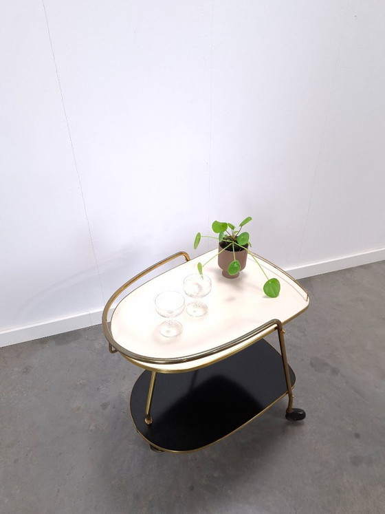 Image 1 of Ilse Möbel trolley met zwart wit formica