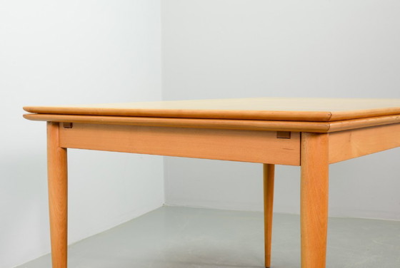 Image 1 of Large Mid-Century Design Extendable Solid Beech Wooden Dining Table in style of Arno Lambrecht. Germany, 1950s.