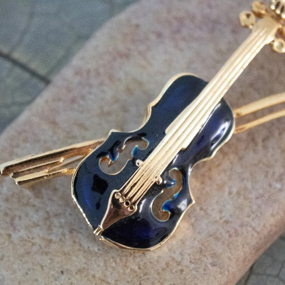 Image 1 of Broche violon vintage : émail bleu marine et métal doré