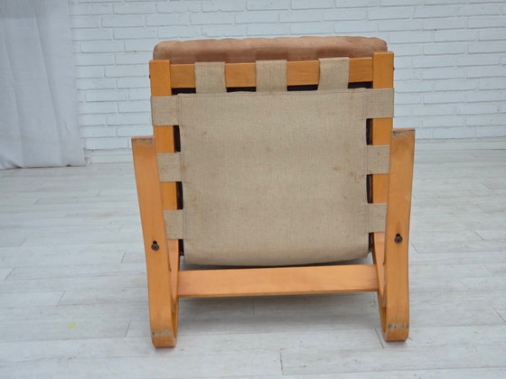 Image 1 of Noorse fauteuil uit de jaren 70, model "Kengu", beige meubelleer.