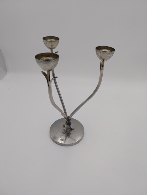 Image 1 of Un candelabro Art Déco a tre luci. Spagnolo, anni '70, in acciaio inossidabile.