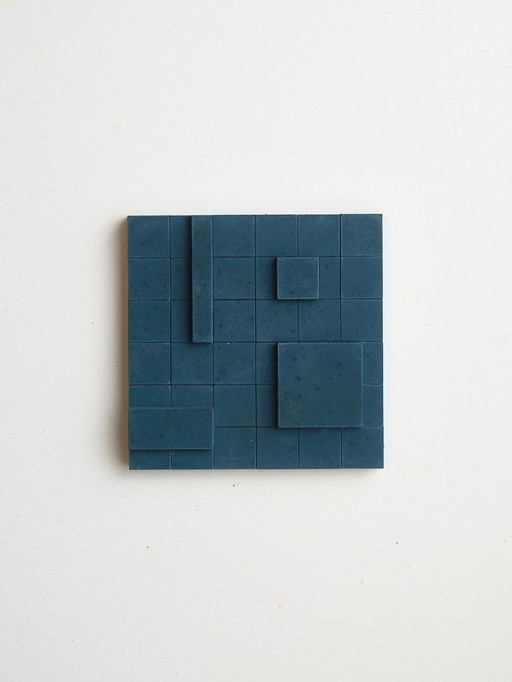 Set of 4 brutalist wall objects.