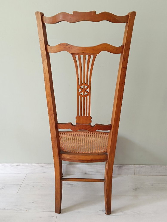 Image 1 of Caned nursery chair