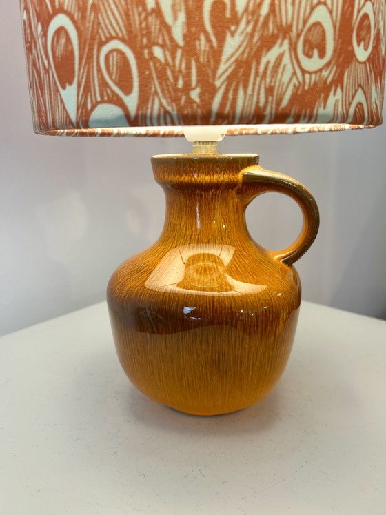Image 1 of Lampada vintage arancione brillante, senza fili, adatta per uso esterno.