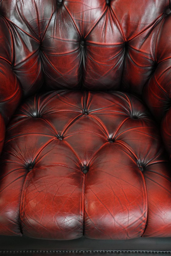 Image 1 of Rode rundleren chesterfield buttonseat fauteuil