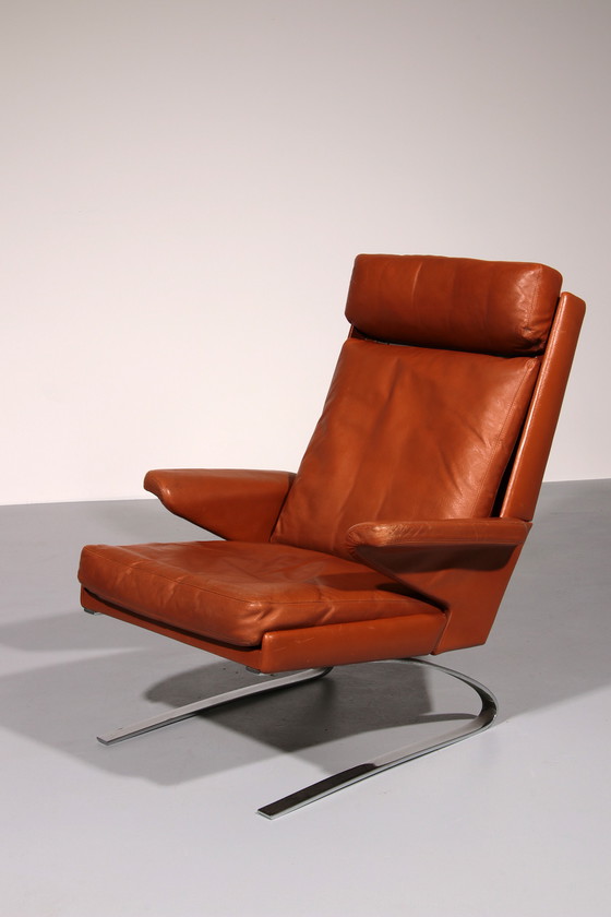 Image 1 of Cognac Leder COR Swing Lounge Stuhl mit Ottomane von Adolf & Schöpfer 1976