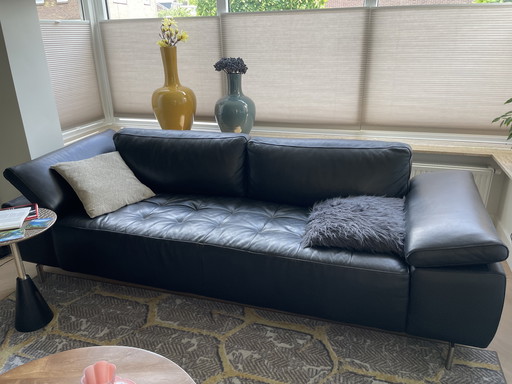 Zwart lederen bank en chaise longue