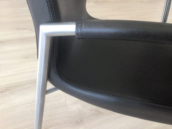 Image 1 of Chaises de salle à manger design, structure en acier inoxydable, revêtement en cuir noir