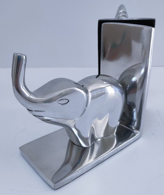 Image 1 of een paar boekensteunen in de vorm van olifanten, gegoten aluminium