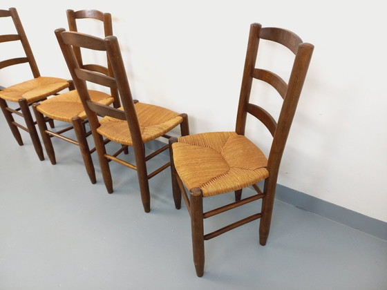 Image 1 of Set van 4 vintage brutalistische stoelen van hout en stro uit de jaren 60.