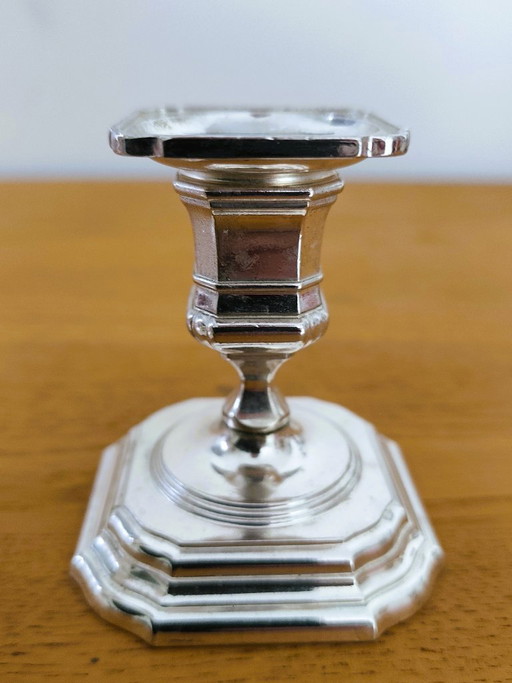Pair of antique silver-plated metal candlesticks
