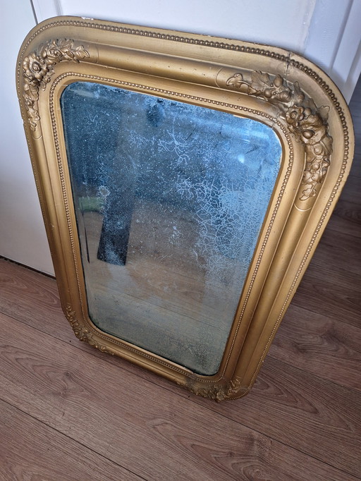 Old mirror with weathered glass / patina