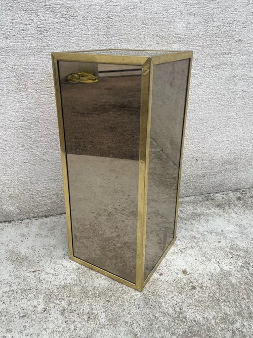 Pedestal/corner column in wood with chrome-plated, multi-faceted mirror finish