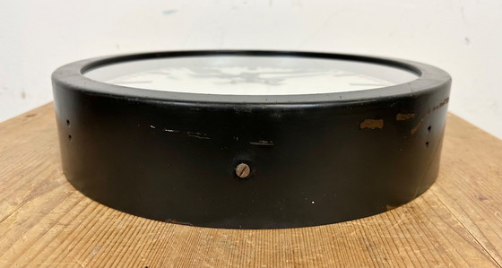 Image 1 of Zwarte industriële fabriekswandklok van Siemens, jaren 50