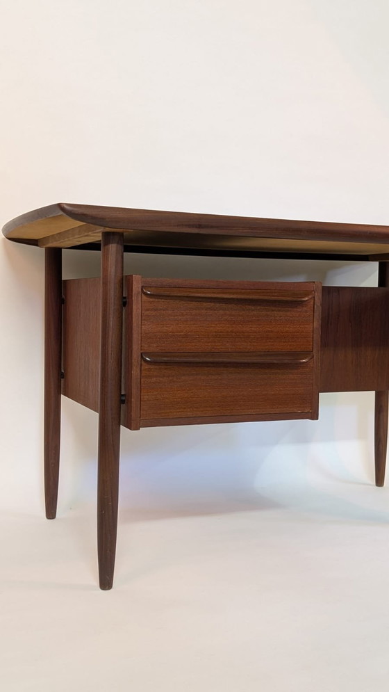 Image 1 of Iconic Mid-Century Teak Desk by Tijseling for Hulmefa made in the 1950s.