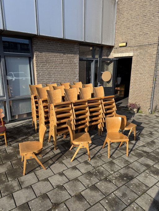 Partij van 50x vintage plywood stapelstoel, Kaderer ‘60