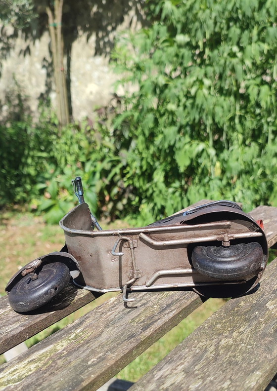 Image 1 of Vespa-style industrial scooter, numbered