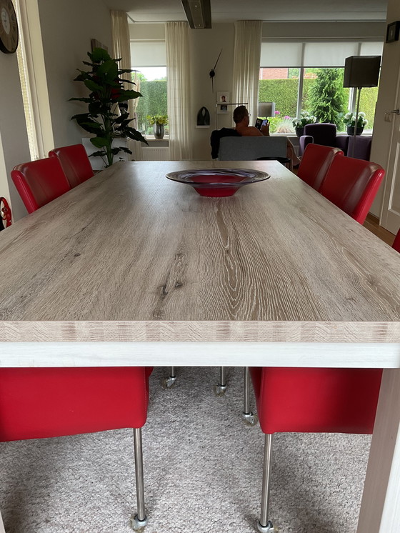 Image 1 of Dining table with 6 leather chairs