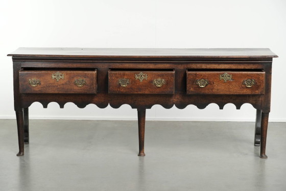 Image 1 of Large English antique oak sideboard/dresser with 3 working drawers from the early 18th century with a beautiful patina