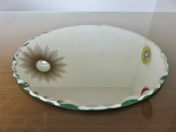 Image 1 of Antieke, grote, ronde, afgeschuinde, vrijstaande spiegel.
