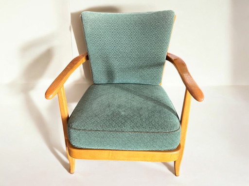 Relax armchair with green velvet cover from the German Mid - Century, as new condition