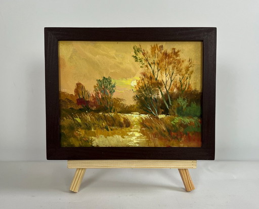 Origineel olieverfschilderij: Herfstboslandschap. Een rustige avond in oranje tinten.