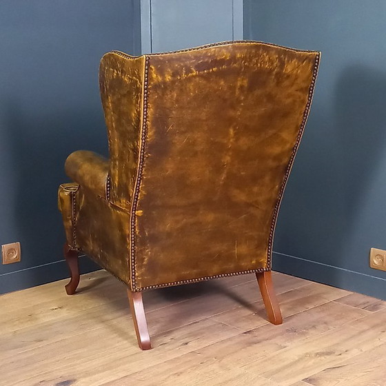 Image 1 of Cognac kleurige Vintage chesterfield fauteuil. 1 van 2