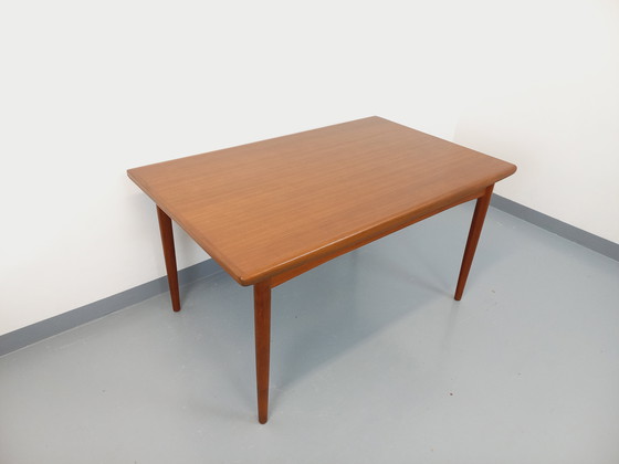Image 1 of Scandinavian 60's vintage Dyrlund rectangular teak dining table with extensions